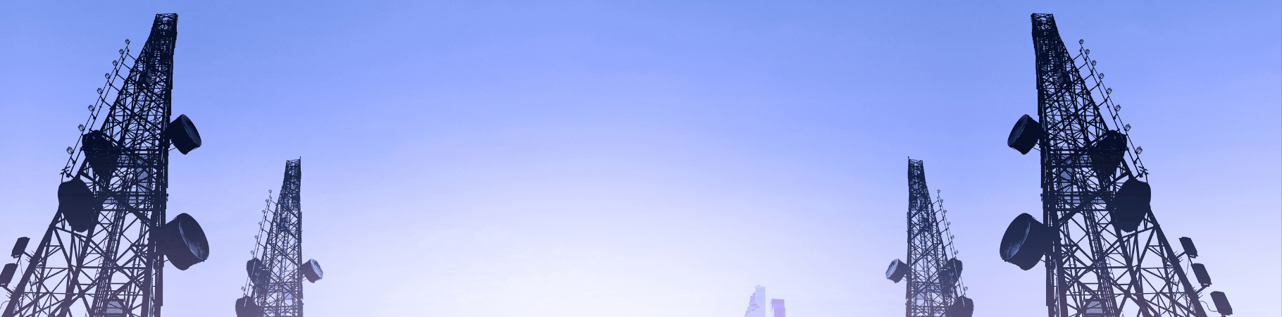 Telecommunication Towers in front of a blue sky
